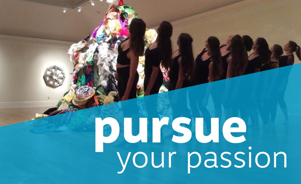 students wearing all black look up at tall mound of fabric during a performance. Title reads "pursue your passion"