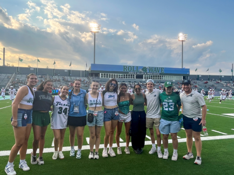 Students at Yuleman Stadium during football game
